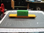 Ho Scale, Union Pacific, Flat Car, Lionel, W/ Load Green Line 20' Container. Fixed Price $9.00.