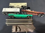 Lot Of 4 Model Train And Rails Lionel Blt 7-57 Pc 9300 6-9302 1-86 Scale. Fixed Price $45.00.