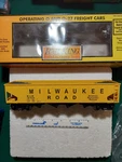 Mth Rail King #30-79046 Milwaukee Road Hopper Car With Operating Coal Load. Fixed Price $59.00.
