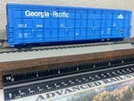 Georgia Pacific / 56FT Thrall All-door Enclosed Lumber Boxcar Ho Scale New. Fixed Price $65.95.