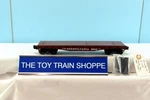 Lionel 17518 Pennsylvania Flatcar W Stakes. Missing Corgi Trucks. Exc Cond.. Fixed Price $14.95.