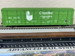 Chandler Corp / 56FT Thrall All-door Enclosed Lumber Boxcar Ho Scale Gold New. Fixed Price $54.95.