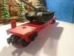 Lionel & 027 Ga Flat Cr With Plastic Battle Tank Load, Exellent Cond. 5-248-5. Fixed Price $27.99.