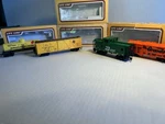 Life-like Scale 4 Pack Hopper, Caboose, Tank Car And With Boxes. Fixed Price $30.00.