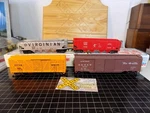SET/4 50' Dd Boxcar, Stock Quadhoppers H/h Couplers (120700). Fixed Price $9.49.