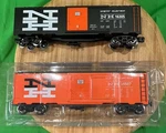 Pair (2) Menards Gauge New Haven Boxcars Unrun. Fixed Price $34.39.