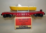 Lionel Postwar 6801-50 Flat Car W/ Yellow Boat In Ob. Fixed Price $65.00.