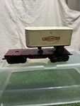 Marx Train - 4 Wheel Erie Flat Car W/ White Burlington Trailer Load Gauge. Fixed Price $35.00.