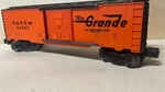 Lionel 63067 Rio Grande Box Car Orange With Black Ends Built 1999. Fixed Price $15.00.