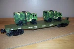 Mth Rail King #30-76042 Army Flat With Two Cargo Trucks. Fixed Price $30.00.