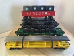 5- Assorted Lionel Gauge Freight Cars 9032, 9303, 3362, Black Flat. Fixed Price $50.00.
