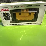 Atlas Gauge Union Pacific Yellow Caboose 6254. Fixed Price $45.00.
