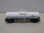 Atlas Omya Single Dome Tank Car # 95336 With Micro Trucks Scale. Fixed Price $15.00.