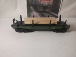 Lionel 3461 Log Dump Flat Car Green With Load. Fixed Price $39.79.