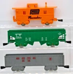 Marx Gauge Orange Pacemaker Caboose, Hopper And Pennsylvania Gondola. Fixed Price $24.95.
