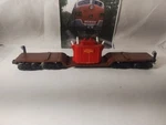 Lionel 6-9233 Diecast Depressed Center Machinery Car With Red Transformer. Fixed Price $48.79.
