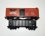 (2) Athearn Scale New Haven 40' Box Car #39288 & Custom Bay Hopper #115720. Fixed Price $26.59.