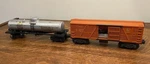 Lot Lionel Post War No. 3656-42 Operating Cattle Car Exc & Oil Tanker 6555. Fixed Price $89.00.