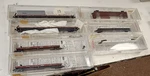 7 New Micro Trains Line 2 89' Flat & 50' Cars ,n Scale Atsf Lot 10. Fixed Price $110.00.