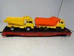 Ho Gauge Southern Pacific Flat Car #0863 Red In Color With 2 Dump Trucks. Fixed Price $9.00.
