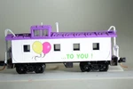 13043 Scale Micro-trains Caboose Happy Birthday. Fixed Price $39.95.