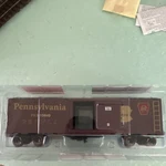 Menards Pennsylvania Railroad Gauge Box Car PRR15040 Brown Yellow Plastic. Fixed Price $15.00.