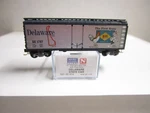 Micro Trains Delaware State Car 40' Plug Box # 1787. Fixed Price $15.95.