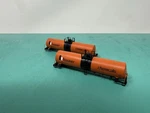 Atlas - 17,360 Tank Car No Trucks/ Safety Rail/ Package Hooker Set Of 2. Fixed Price $30.00.