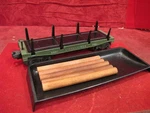 Lionel 3461 Log Dump Flat Car Green With Load And Bin Works. Fixed Price $28.95.