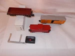 American Flyer 24413 Art, 938 Lighted Caboose, 919 Cbq Dump Car Lot #X-99. Fixed Price $73.59.
