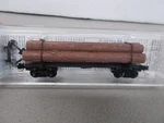 Micro Trains # 113010 40' Skeleton Log Car With Load Scale Lot F. Fixed Price $25.00.