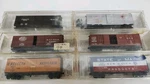 Lot Micro Trains Box Cars C8 T16. Fixed Price $64.99.