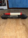 Postwar Lionel Black 6175 Rocket Flat Car W/ Original. Fixed Price $48.00.