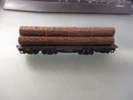 Bachmann Ho Scale Car W/ Logs Penn Central 17561. Fixed Price $10.00.