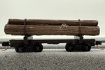 Micro Trains 30' Skeleton Log Car W/ Load #4 - 113510. Fixed Price $29.99.