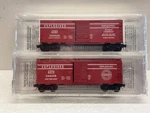 Scale Micro Trains Mtl Special Run 98-91 6464 Series Exploding Box Car 2-PACK. Fixed Price $275.00.