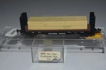 Scale Atlas 2281 Southern Pacific Bulkhead Flat Car With Load C52509. Fixed Price $17.99.