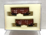 Full Throttle Z Scale Uncle Will Canadian National 2 Bay Woodchip Hoppers. Fixed Price $125.00.