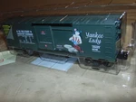 Menards Gauge 279-3101 Yankee Lady Art Boxcar #88 -new In Plastic. Fixed Price $40.00.