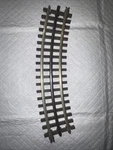 Atlas Gauge 0-36 Full Curve Section Rail Track, Item# 6066. Fixed Price $7.00.