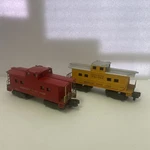 X American Flyer Line 24631 & 904 Cabooses Lot. Fixed Price $19.95.