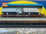 Trailer Train - 60FT Flat Car W/ 2 Ford Coe Stakebed Trucks Ho Scale New. Fixed Price $76.95.